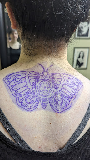 Explore tattoo book ideas, creative tattoo ideas in East Palestine, available at Bulldog Custom Tattooing