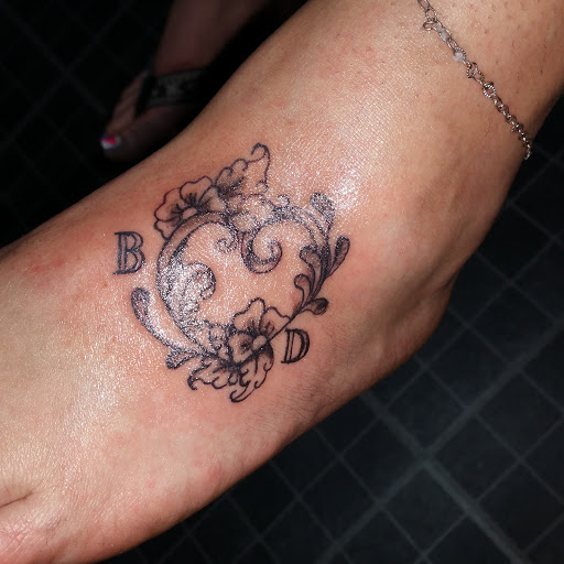 Explore honeycomb tattoo ideas, creative tattoo ideas in Centre, available at Ink You Tattoos