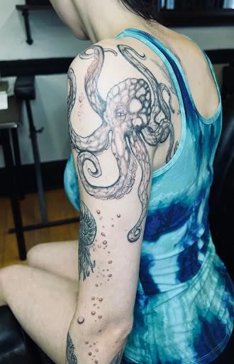 Find gay tattoo ideas for guys for your next unique tattoo in Newport at The Ravens Hallow Tattoo llc