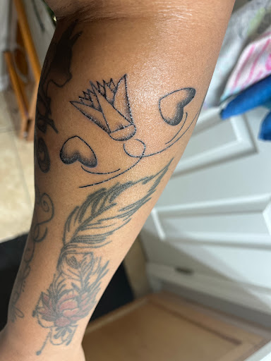 Explore tribal sleeve tattoo ideas, creative tattoo ideas in Davenport, available at Fine Ink Studios Tattoos
