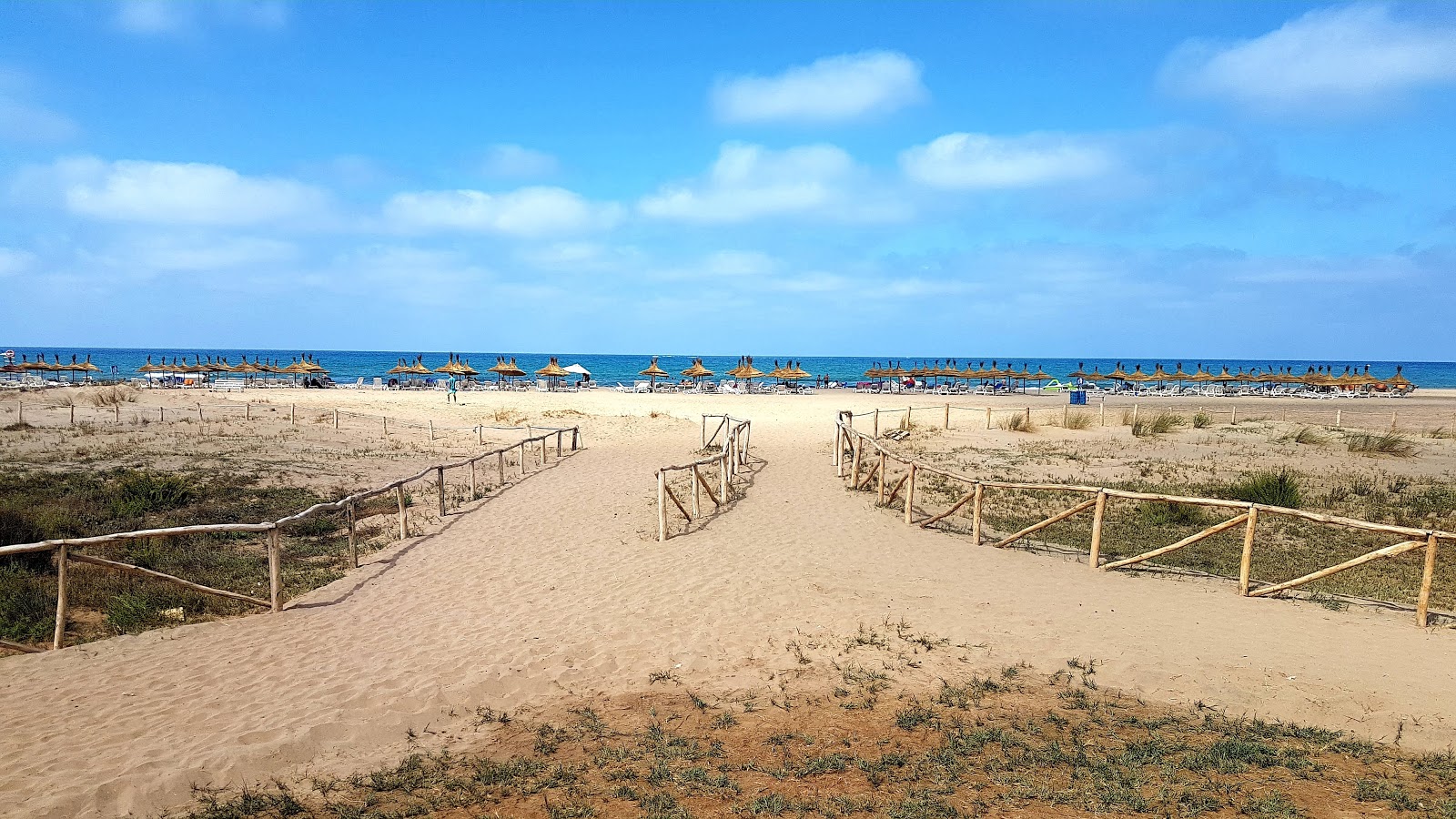 Foto av Saidia beach med lång rak strand