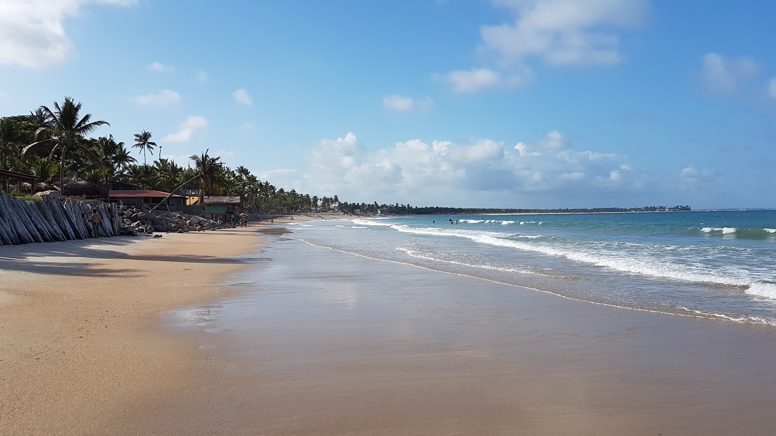 Photo de Praia de Maracaipe avec sable fin et lumineux de surface