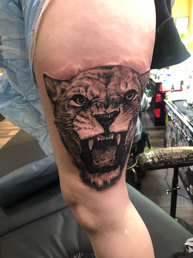 Explore leg sleeve tattoo ideas for women, creative tattoo ideas in Duluth, available at Gitchee Gumee Tattoo