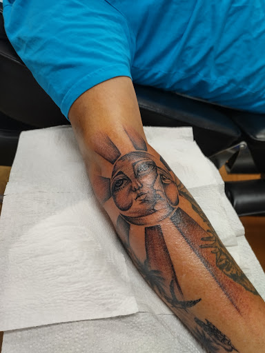 Explore elbow tattoo ideas male, creative tattoo ideas in Gunnison, available at Facing Fear Tattoo