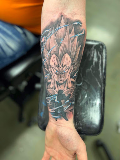 Explore lower arm sleeve tattoo ideas, creative tattoo ideas in Wallace, available at Artistic Abyss Tattoo Collective