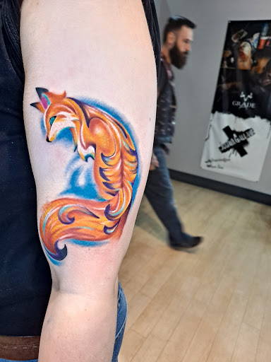 Explore divorce tattoo ideas for women, creative tattoo ideas in Fort Wayne, available at Grade A Tattoos and Body Piercing