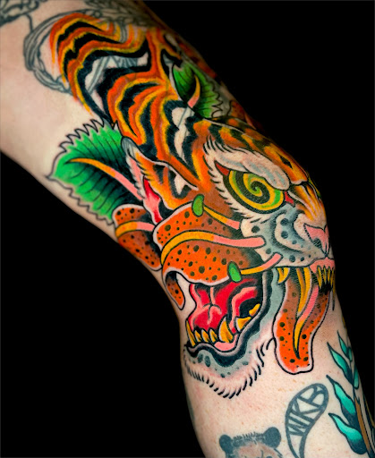 Explore half leg sleeve tattoo ideas, creative tattoo ideas in Johnson City, available at Gold Cross Tattoo Co.