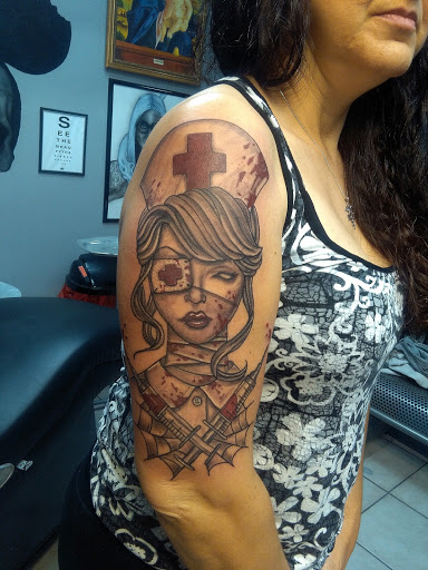 Explore saint michael tattoo ideas, creative tattoo ideas in Bradenton, available at Memory Lane Tattoo Co.