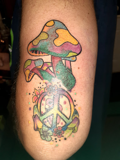 Explore tattoo ideas for losing a loved one, creative tattoo ideas in Angola, available at Hoodlum Ink