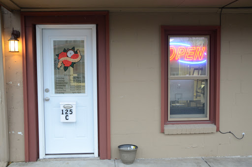 Find western tattoo ideas for your next unique tattoo in Greenfield at Tattoos In Time Studio