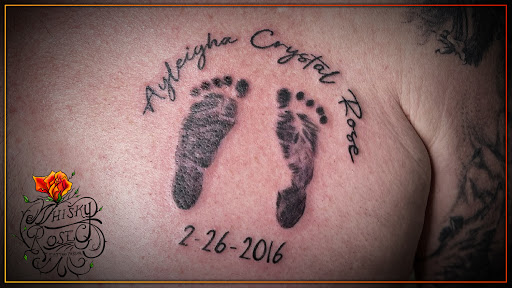 Find charm bracelet tattoo ideas for your next unique tattoo in Minocqua at Whisky Rose Tattoo Parlor