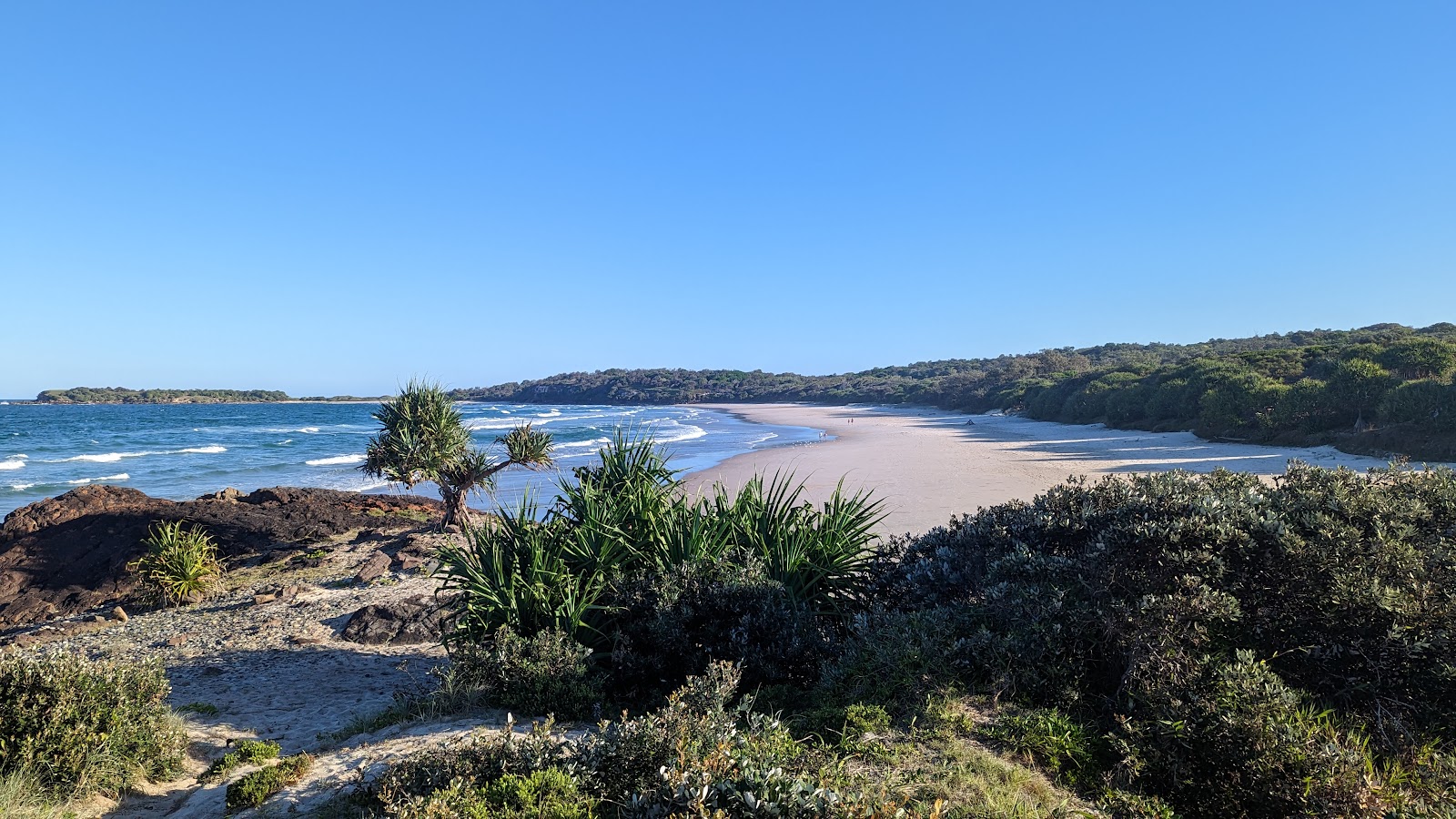 Foto van Chinamens Beach met beige zand oppervlakte