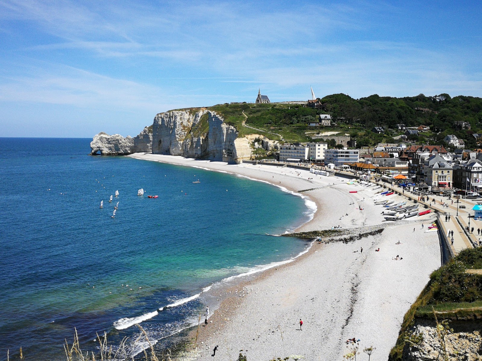 Photo of Etretat Beach with turquoise pure water surface