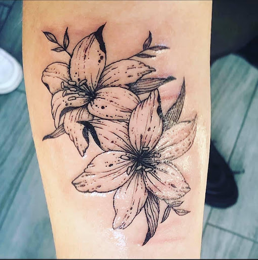 Explore literary tattoo ideas, creative tattoo ideas in Pocatello, available at Into You Piercing and Tattoo