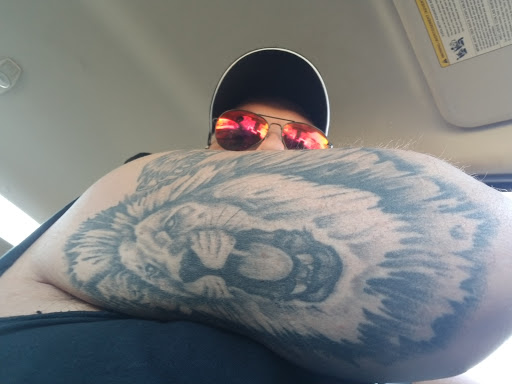 Tattoo Shop «Topnotch Tattoo», reviews and photos, 216 E Chicago St, Elgin, IL 60120, USA