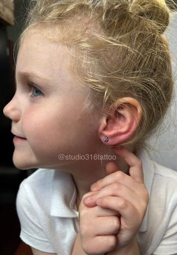 Explore behind ear tattoo ideas, creative tattoo ideas in Jackson Heights, available at studio 316 Tattoo & Body Piercing