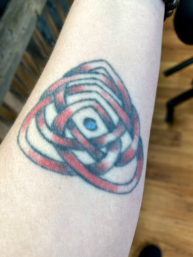 Explore grumpy tattoo ideas, creative tattoo ideas in Belleville, available at Almighty Tattoos