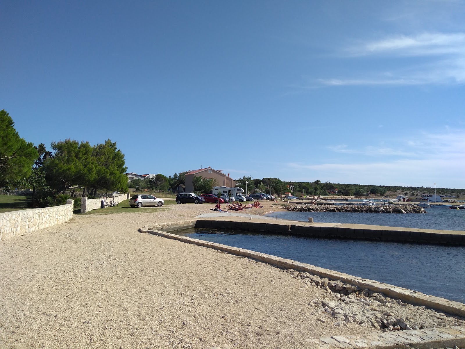 Foto di Port of Proboj Beach con una superficie del terreno roccioso