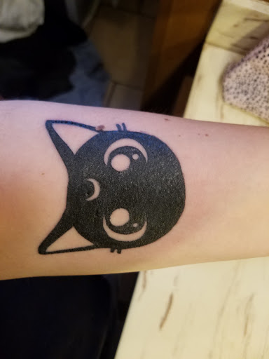 Find arm band tattoo ideas for your next unique tattoo in Addison at Cat Tattoo