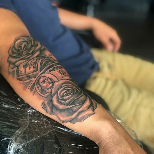 Explore arrow tattoo ideas for men, creative tattoo ideas in Dallas, available at Legendary Art Tattoo Studio