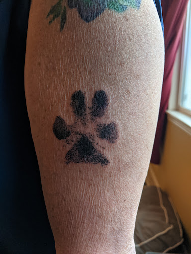 Explore cover up tattoo ideas female shoulder, creative tattoo ideas in Des Moines, available at Lucky Gal Tattoo & Piercing