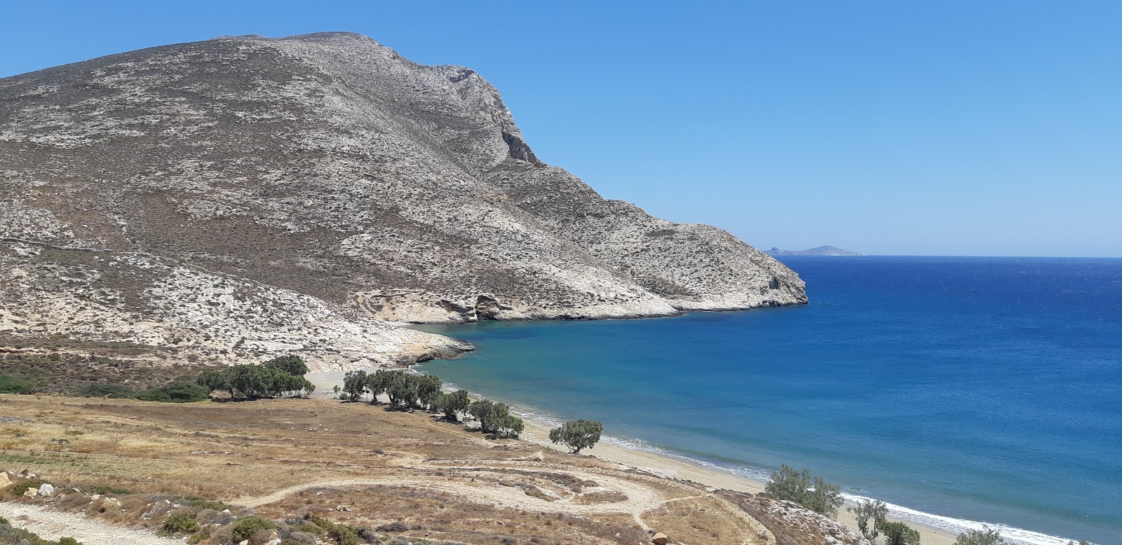 Foto di Paralia Monastiri con una superficie del sabbia beige