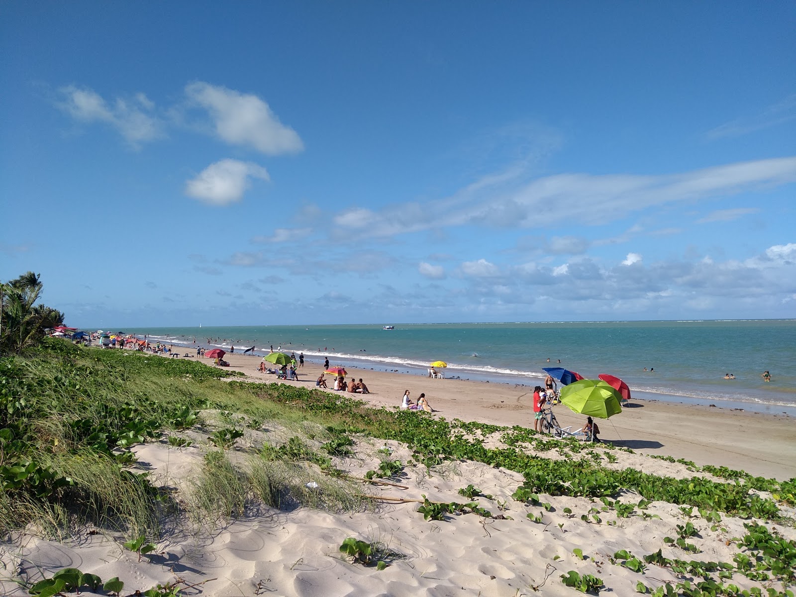 Foto van Formosa Beach met helder zand oppervlakte