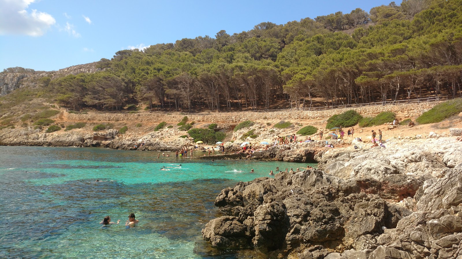 Photo of Cala Minnola beach with partly clean level of cleanliness