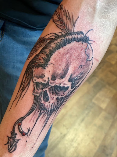 Explore mother son tattoo ideas with meaning, creative tattoo ideas in Pikeville, available at The Carbon Canary Tattoo Studio