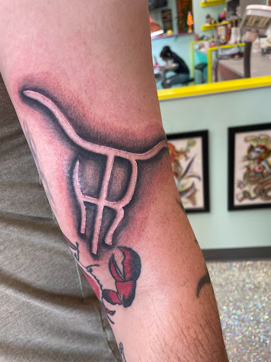 Explore left chest tattoo ideas, creative tattoo ideas in Houston, available at The Neon Jackal Tattoo