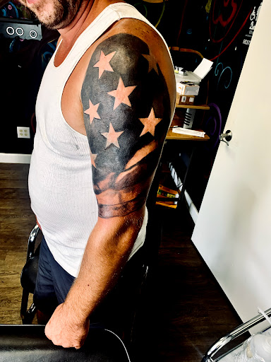 Explore women's quarter sleeve tattoo ideas, creative tattoo ideas in Lake City, available at Crooked Spines Tattoo Studio