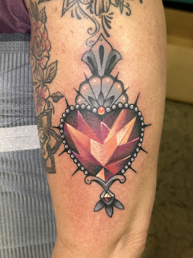 Explore october birth flower tattoo ideas, creative tattoo ideas in Spring, available at Skin Stories Tat2