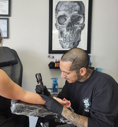 Explore blackout tattoo ideas, creative tattoo ideas in Yucaipa, available at ChoIo Pierces & Tattoo Studio