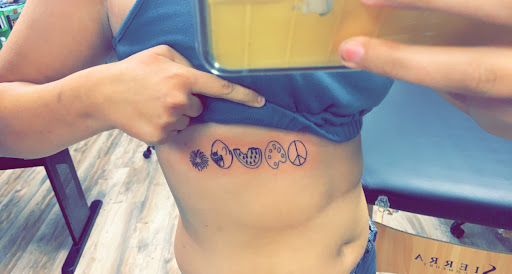 Explore country music tattoos ideas, creative tattoo ideas in Gautier, available at Voodoo Tattoo