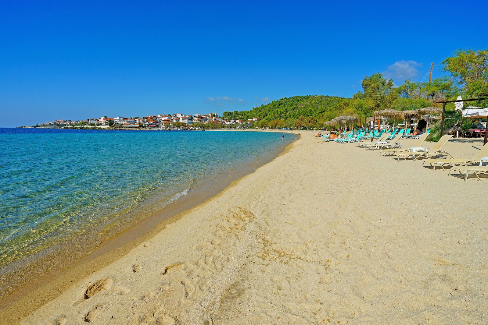 Fotografija N.Marmaras beach z svetel fin pesek površino