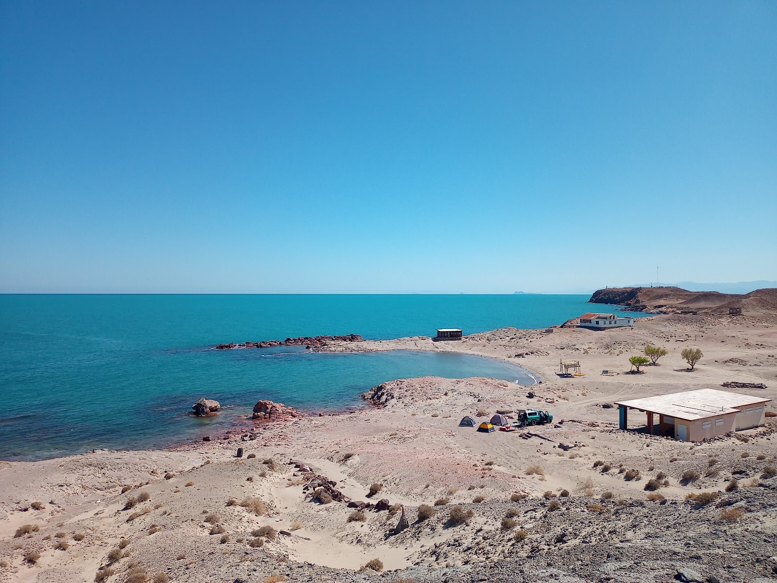 Foto di Playa Escondida con una superficie del sabbia beige