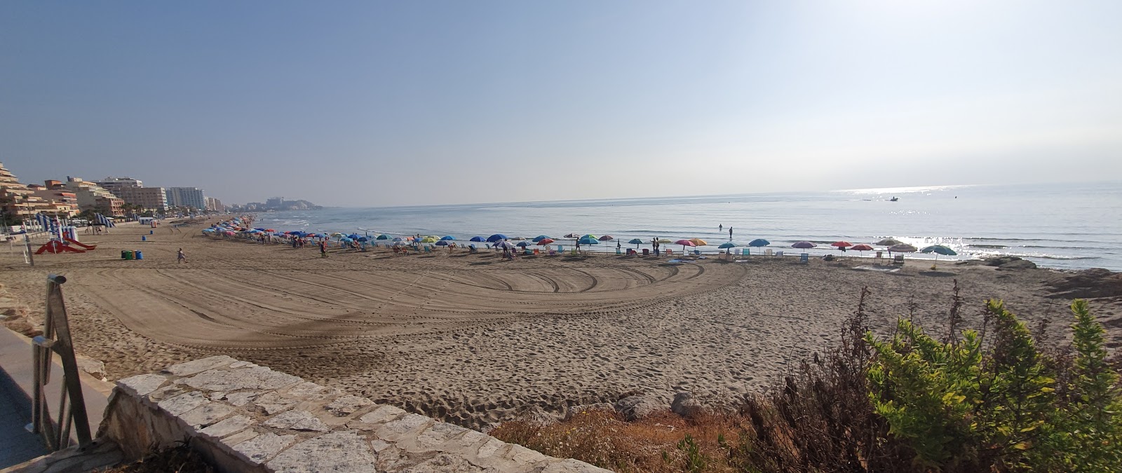 Foto von Playa Morro de Gos und die siedlung