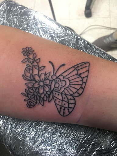 Explore men's family sleeve tattoo ideas, creative tattoo ideas in Crystal City, available at Meraki Tattoo and Piercing