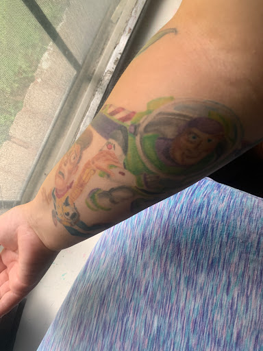 Explore stomach tattoo ideas for women, creative tattoo ideas in Dallas, available at Controversy Ink Tattoo Studio