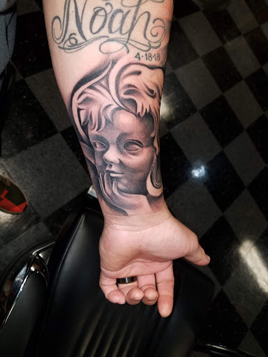 Explore banksy tattoo ideas, creative tattoo ideas in Whittier, available at Uptown Tattoos & Piercing