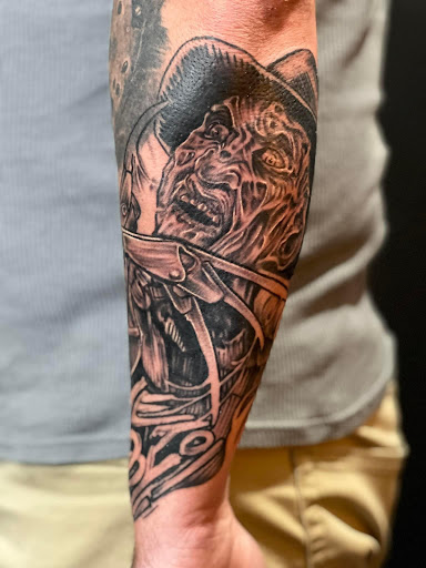 Explore small fish tattoo ideas, creative tattoo ideas in Warner Robins, available at Untold Pain Tattoo Studio