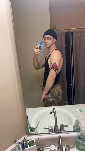 Explore loyalty over love tattoo ideas, creative tattoo ideas in Spartanburg, available at Amethyst Tattoo Studio