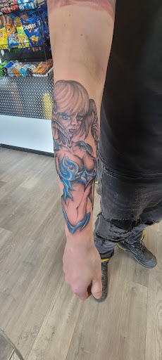 Explore fish tattoo ideas for men, creative tattoo ideas in Fort Gratiot, available at Stained Glass Tattoo & Body Piercing