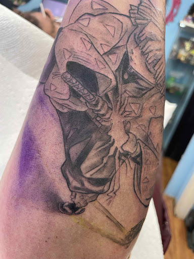 Explore music tattoo ideas sleeve, creative tattoo ideas in Tampa, available at Ironblood Tattoos