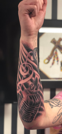 Explore crane tattoo ideas, creative tattoo ideas in Barberton, available at Magic City Tattoo Company