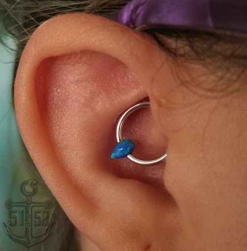 Explore rainbow bridge tattoo ideas, creative tattoo ideas in Kearney, available at Studio 5150 Piercing & Fine Jewelry