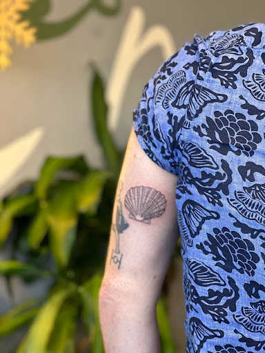 Explore feminine dragon tattoo ideas, creative tattoo ideas in Kailua Kona, available at Mehana Tattoo