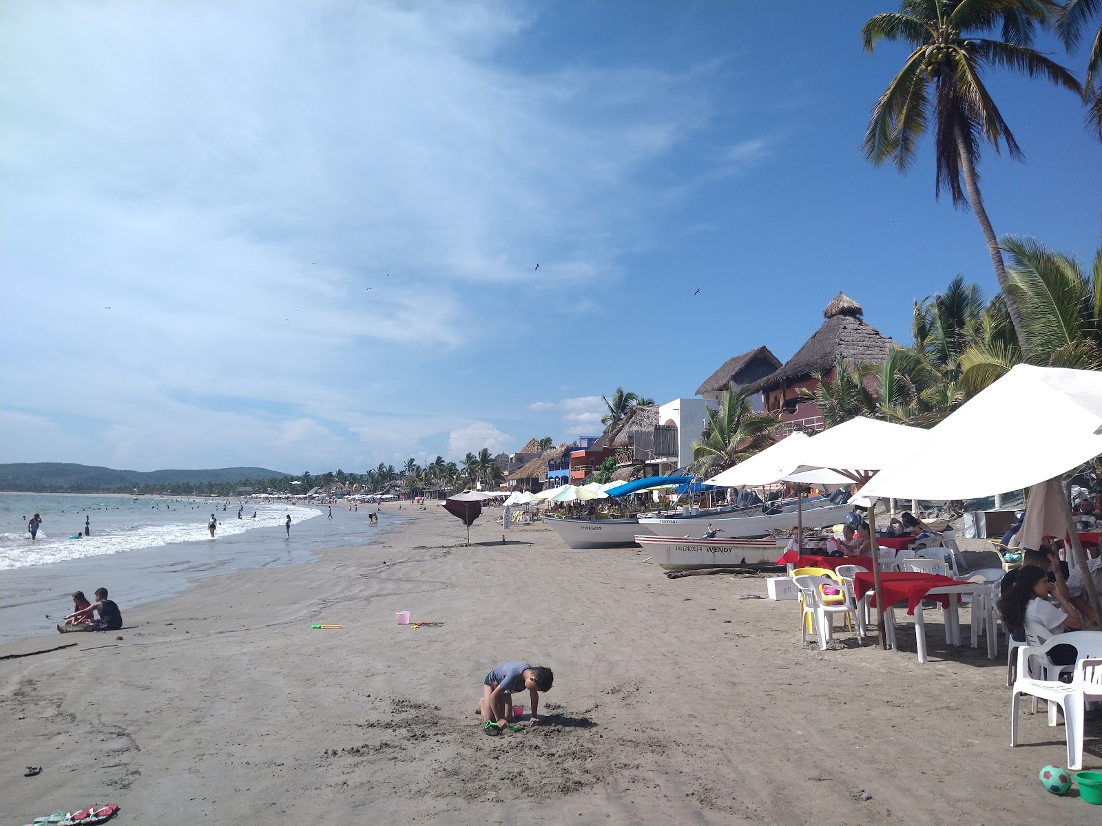 Foto de Playa La Manzanilla apoiado por penhascos