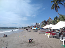 Playa La Manzanilla'in fotoğrafı uçurumlarla desteklenmiş