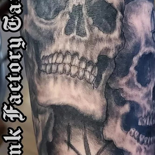 Explore mens tricep tattoo ideas, creative tattoo ideas in Watertown, available at Wonderland Ink Factory Tattoos and Piercing